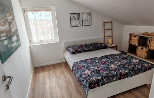 Ένα ή περισσότερα κρεβάτια σε δωμάτιο στο Apartman s bazenom - Sasa by Villas Guide