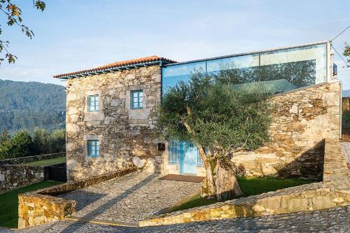 ポンテ・デ・リマにあるCapim Limão Country Houseの石造りの家