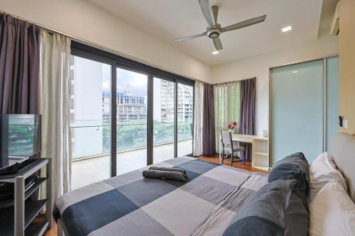 Ένα ή περισσότερα κρεβάτια σε δωμάτιο στο The Elements Ampang by Greenhome