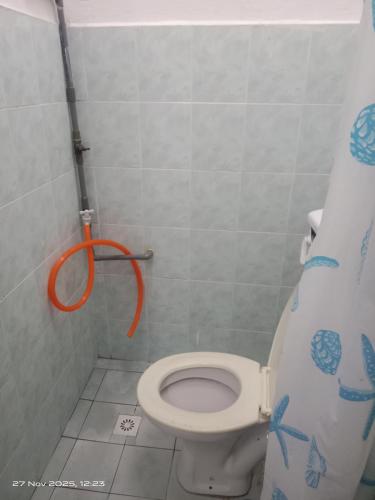 Ένα μπάνιο στο Homestay Casa Mutiara