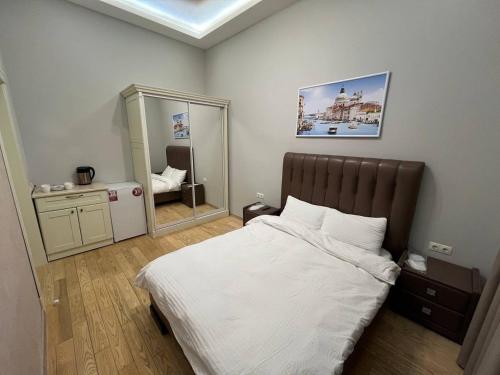 Ένα ή περισσότερα κρεβάτια σε δωμάτιο στο Отель Преображенский