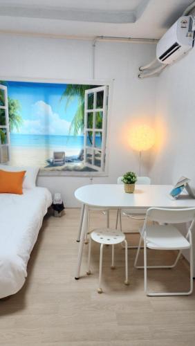 Voodi või voodid majutusasutuse 마린미니하우스 toas