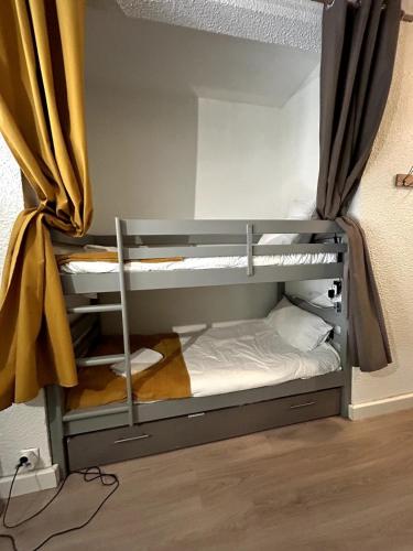 Ένα ή περισσότερα κρεβάτια σε δωμάτιο στο Le Pré Carré Studio premium, ski easy et centre St Lary