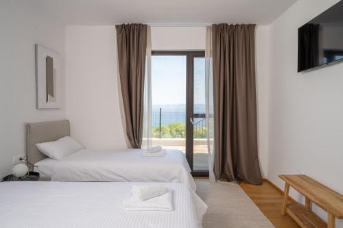 Ένα ή περισσότερα κρεβάτια σε δωμάτιο στο Wild Adriatic Way