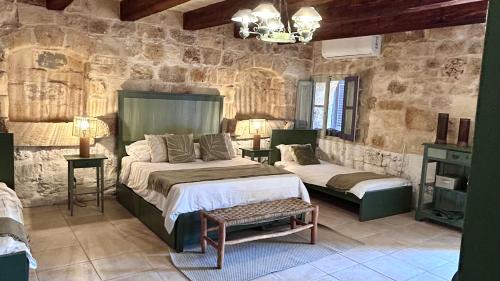 Voodi või voodid majutusasutuse Ta Skorba Farmhouse Mgarr toas