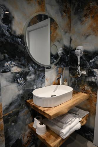 Phòng tắm tại Hotel Restaurant Savoja