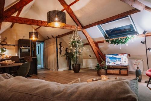 Postel nebo postele na pokoji v ubytování Jacques van Marken Erfgoed