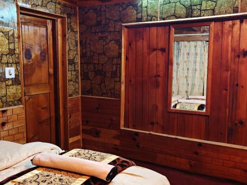 Ένα ή περισσότερα κρεβάτια σε δωμάτιο στο Oran Stays Shoja