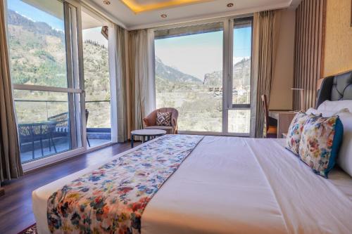 Voodi või voodid majutusasutuse Carom Hotel Manali toas