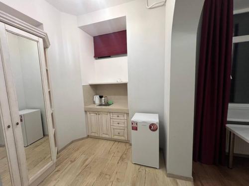 Η κουζίνα ή μικρή κουζίνα στο Отель Преображенский