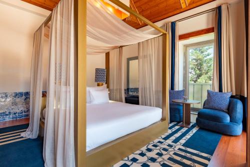 Giường trong phòng chung tại Palácio do Governador - Lisbon Hotel & Spa