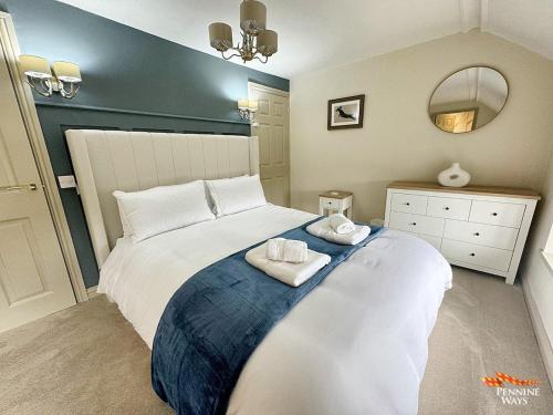 Postel nebo postele na pokoji v ubytování Headmasters House