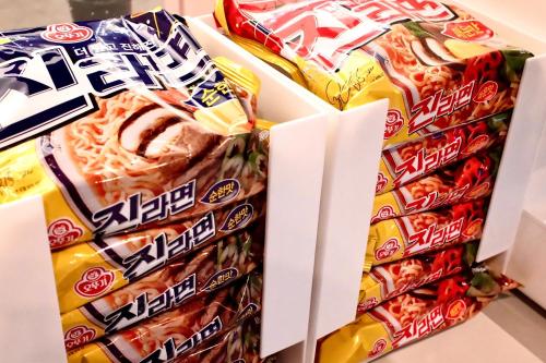 three boxes of chinese junk food snacks at INSOMNIA Hotel in Hyomoktong-Ilgu