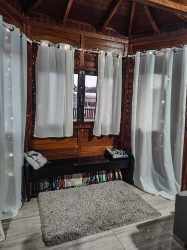 En eller flere senge i et værelse på Casa com Piscina em Balneário Piçarras