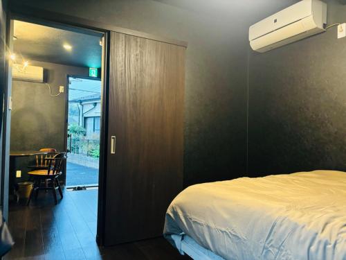 Ένα ή περισσότερα κρεβάτια σε δωμάτιο στο Haveanice Havanice - Vacation STAY 15818