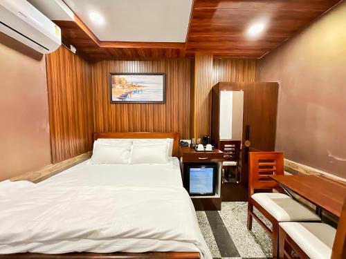 Ένα ή περισσότερα κρεβάτια σε δωμάτιο στο Black bird hotel and restaurant