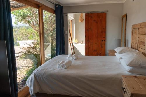 Ένα ή περισσότερα κρεβάτια σε δωμάτιο στο Mountain Magic Hoekwil