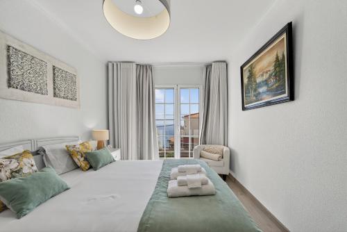 Postel nebo postele na pokoji v ubytování Florence Vila