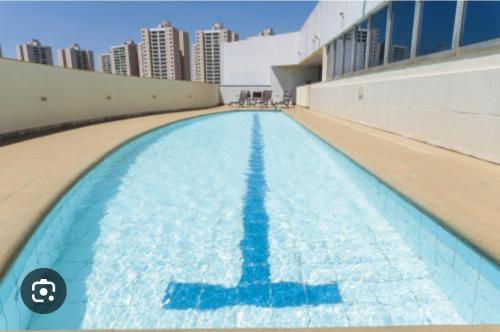 Der Swimmingpool an oder in der Nähe von 705 Flat hotel Taguatinga