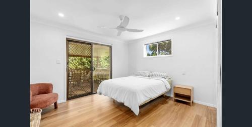 Ένα ή περισσότερα κρεβάτια σε δωμάτιο στο Cosy Kingscliff Family Home Walk To Beach