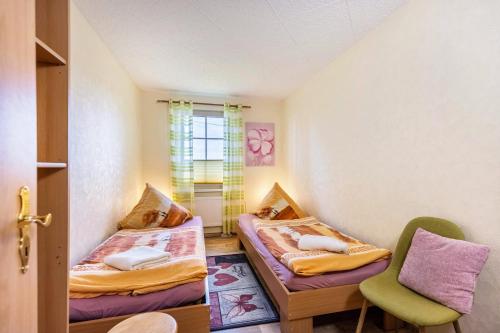 Postel nebo postele na pokoji v ubytování Ferienhaus in Wald- und Seenähe