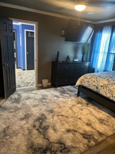 Ένα ή περισσότερα κρεβάτια σε δωμάτιο στο Bannock Manor