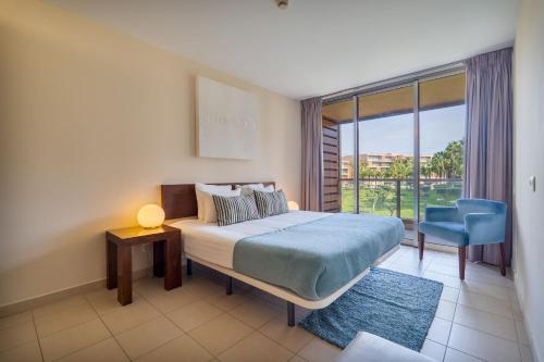 Stylish 2Bdr Flat with Pool in Salgados by Lovelystay