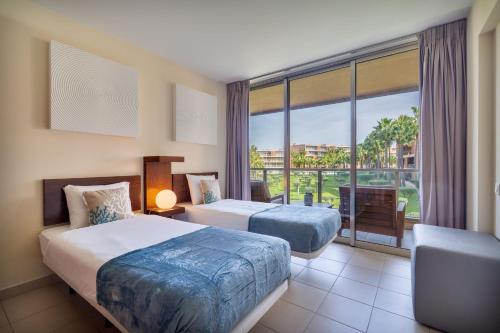 Stylish 2Bdr Flat with Pool in Salgados by Lovelystay