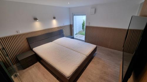 Postel nebo postele na pokoji v ubytování Ferienhaus Plattfisch