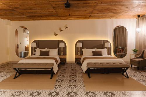 Ένα ή περισσότερα κρεβάτια σε δωμάτιο στο Casa Frida