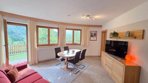 TV a/nebo společenská místnost v ubytování Apart Franziska