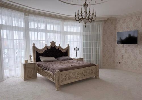 Ένα ή περισσότερα κρεβάτια σε δωμάτιο στο Luxury Villa