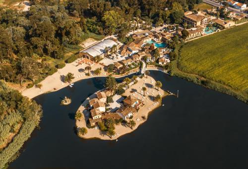an aerial view of a resort on a lake at Hotel Quinta Da Lagoa in Praia de Mira