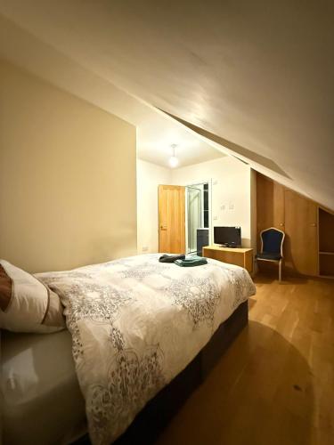 Ένα ή περισσότερα κρεβάτια σε δωμάτιο στο Tulse Hill