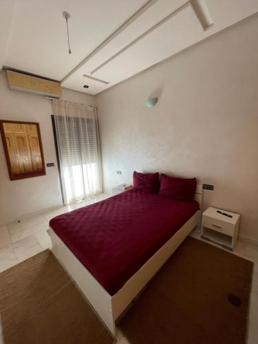 Ένα ή περισσότερα κρεβάτια σε δωμάτιο στο Le cosy du champs de course