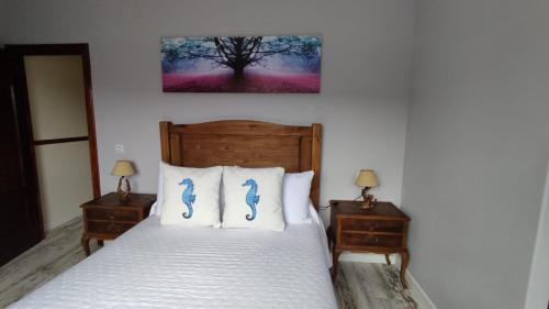 Postel nebo postele na pokoji v ubytování Casa Rural Los Acebos II