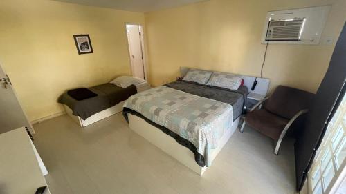 Postel nebo postele na pokoji v ubytování Guest House C da Montanha