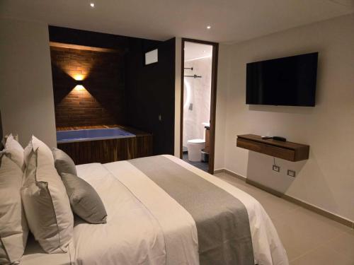 Una cama o camas en una habitación de Rooca Urban