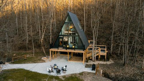 an overhead view of a glass house in the woods at The Pinnacle in Logan