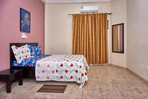 Ένα ή περισσότερα κρεβάτια σε δωμάτιο στο Felicia APPART