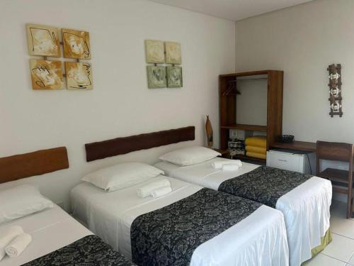 Postel nebo postele na pokoji v ubytování Pousada Paraiso da Barra