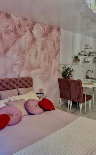 Ένα ή περισσότερα κρεβάτια σε δωμάτιο στο Jacuzzi Bliss by the Motława