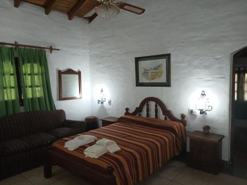 Postel nebo postele na pokoji v ubytování La Posta del Mistol