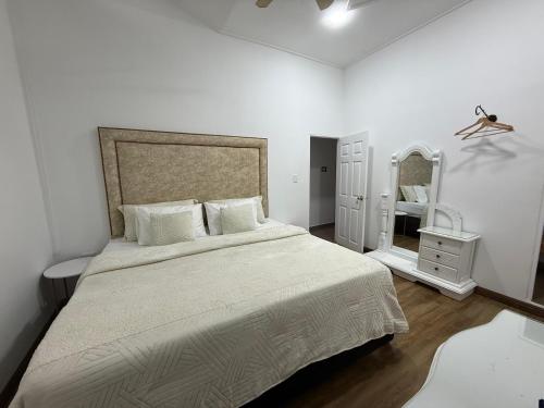 Ένα ή περισσότερα κρεβάτια σε δωμάτιο στο Casa colonial filandia