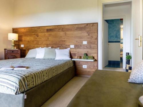 En eller flere senge i et værelse på La Vedetta Country Rooms