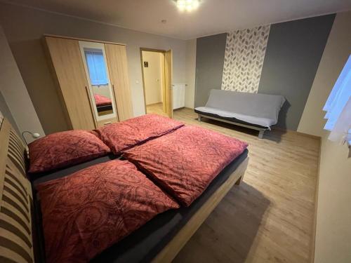 Ένα ή περισσότερα κρεβάτια σε δωμάτιο στο Ferienwohnung Susanna