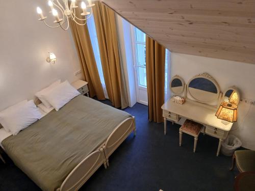 Ένα ή περισσότερα κρεβάτια σε δωμάτιο στο Labanoras