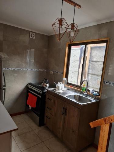 Η κουζίνα ή μικρή κουζίνα στο Cabaña pucura