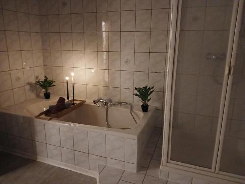 Ένα μπάνιο στο Ferienwohnung Waldwinkel