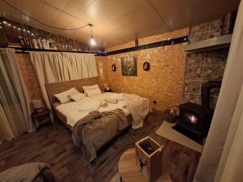 Rúm í herbergi á Chatka U Vlka